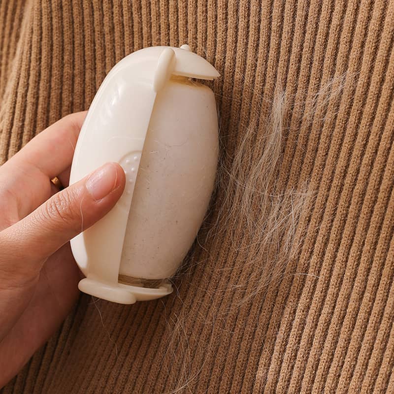 Niedlicher tragbarer wiederverwendbarer klebriger Fusselroller Ball