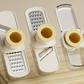 3-in-1-Mandoline-Hobel mit Behälter