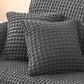 Sofaüberzug mit elastischen Rüschen und Noppenstruktur