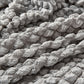 Sofaüberzug mit elastischen Rüschen und Noppenstruktur