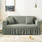 Sofaüberzug mit elastischen Rüschen und Noppenstruktur